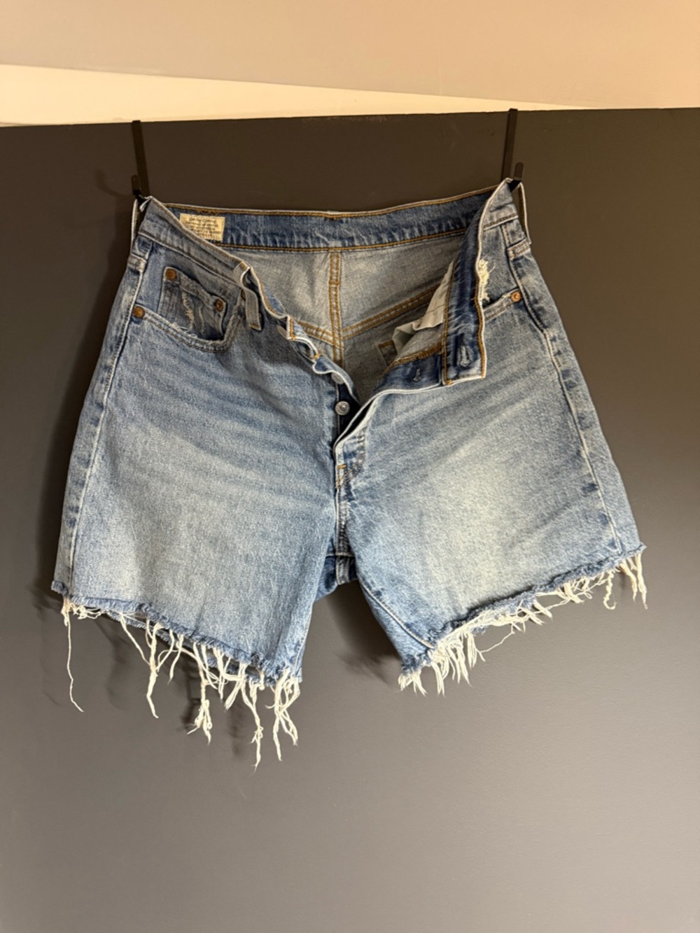Levi's Light Blue Frayed Denim Cutoff Shorts